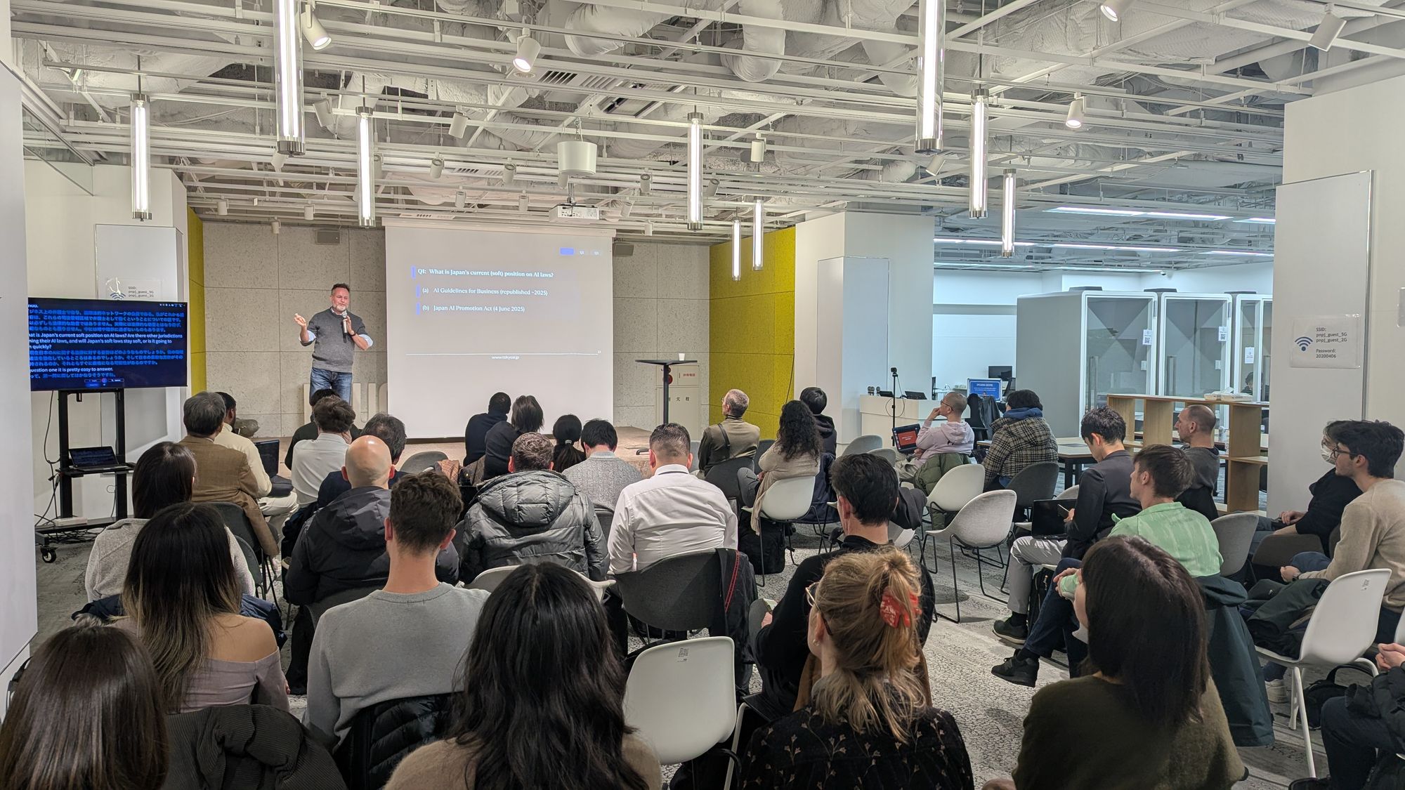 Speaker and audience at the Tokyo AI AI x Society - Operationalizing AI Governance (TAI AIS #05) event.