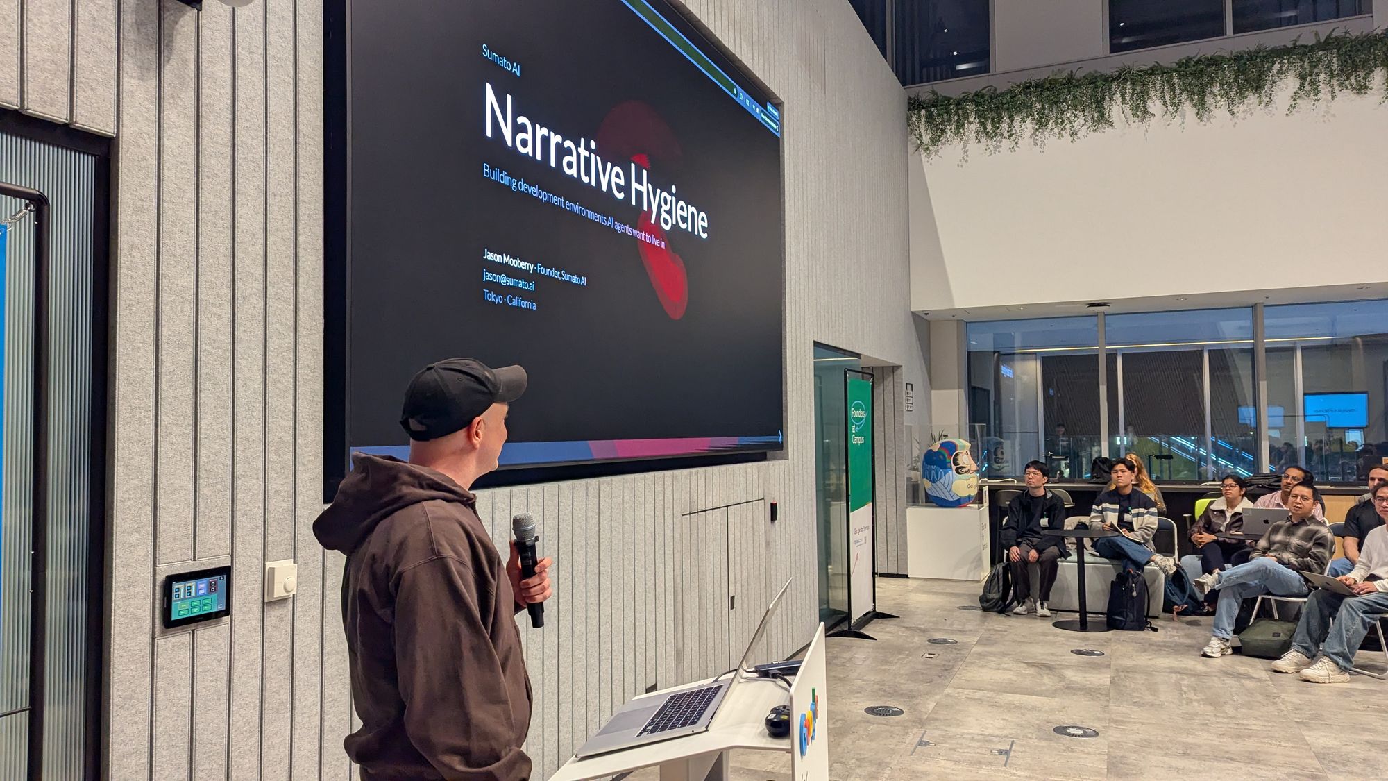 Speaker presentation and audience at Beyond the Wrapper - Engineering End-to-End Agentic Systems.